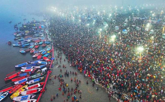 Crowd of devotees in the tent city built on the sands of the Ganges, grand start of the Mahakumbh, crowd of devotees in the sands of Sangam