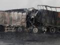 Coal-laden truck hits rice-laden truck from behind: Both trucks catch fire, driver dies