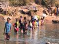 Poor village water, education, health, pure drinking water, no transportation facilities, people risk their lives to cross the river.